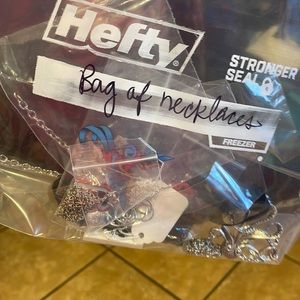 Bag of unused new retro necklaces